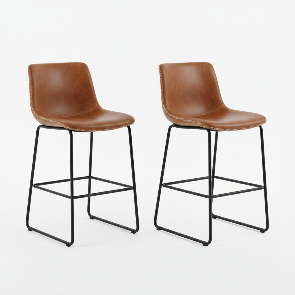 Two brown bar stools with black metal legs in a modern kitchen setting.