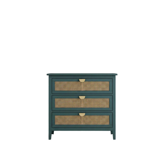 Blue dresser with wicker drawers in a room with a plant and window.