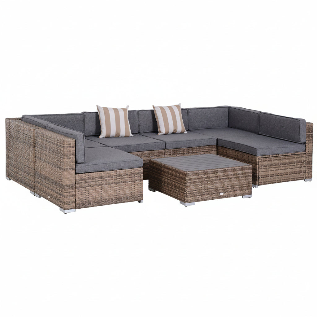 Outdoor furniture set with wicker frame and gray cushions on a white background