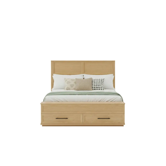 Wooden bed with white bedding in a room with green walls and a plant.